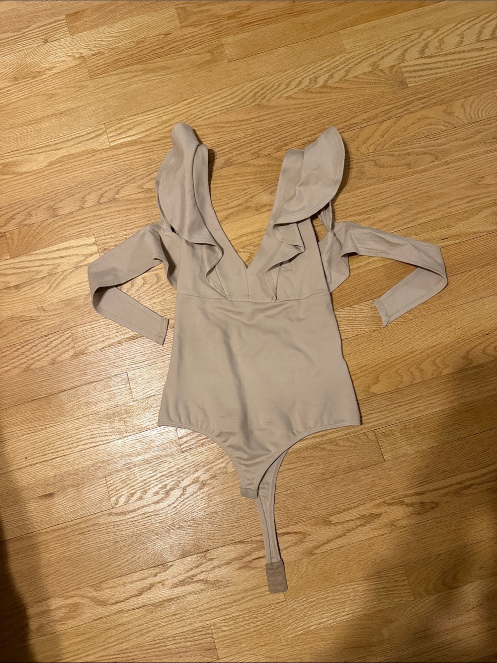Ruffle V-Neck Long Sleeve Bodysuit in Light Beige